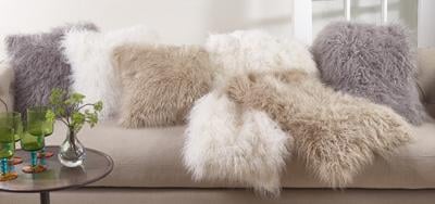 fur pillows on couch