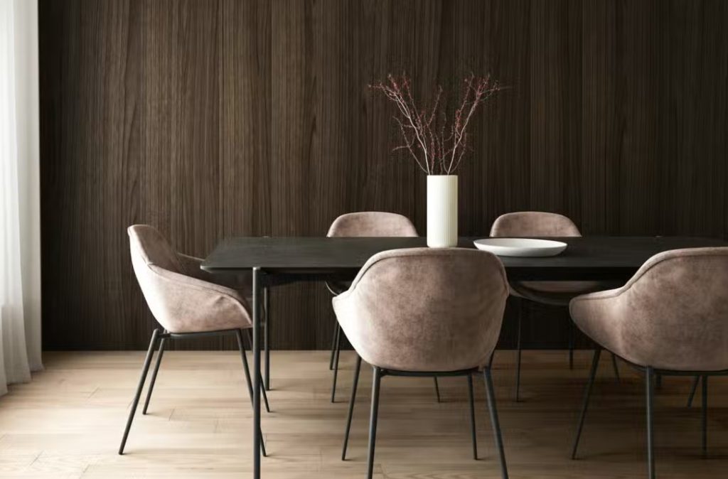 A Black dining table with white dining chairs