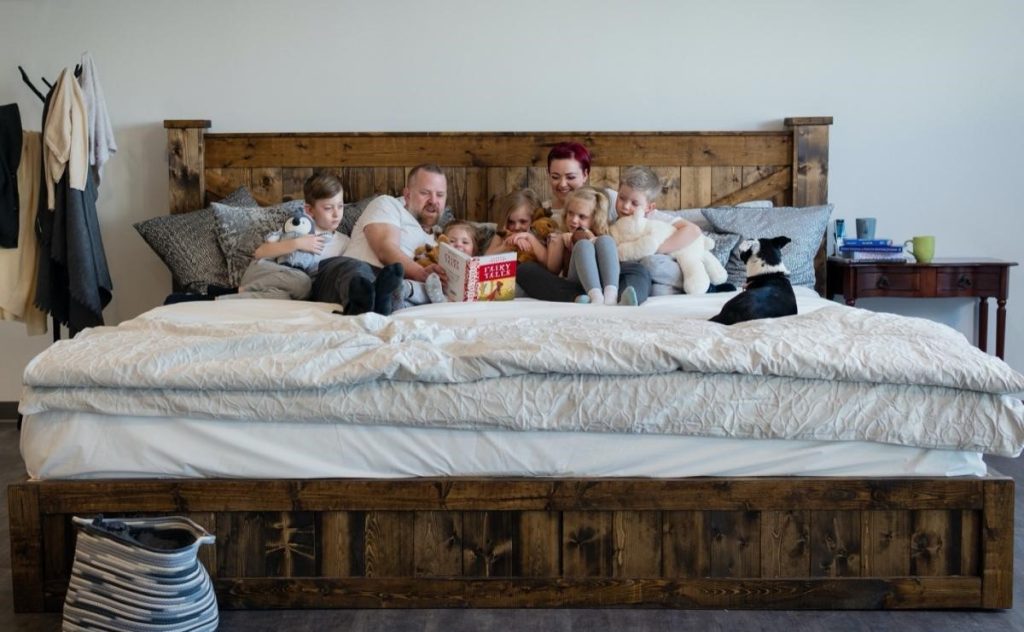 Family Enjoying on Alaskan King Bed