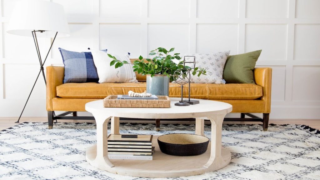 Sofa height coffee table with tray and plant